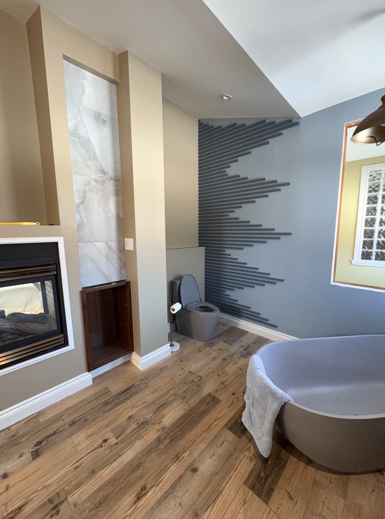 Herringbone tile suite bathroom renovation, Orléans